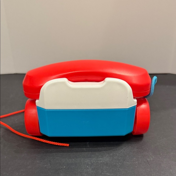 Fisher-Price Toddler Pull Toy Chatter Telephone Pretend Phone with Rotary Dial - Picture 3 of 6